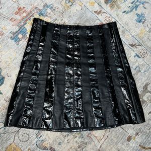 Bebe mixed leathers mini skirt
